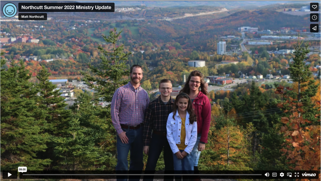 family picture overlooking the city of Corner Brook